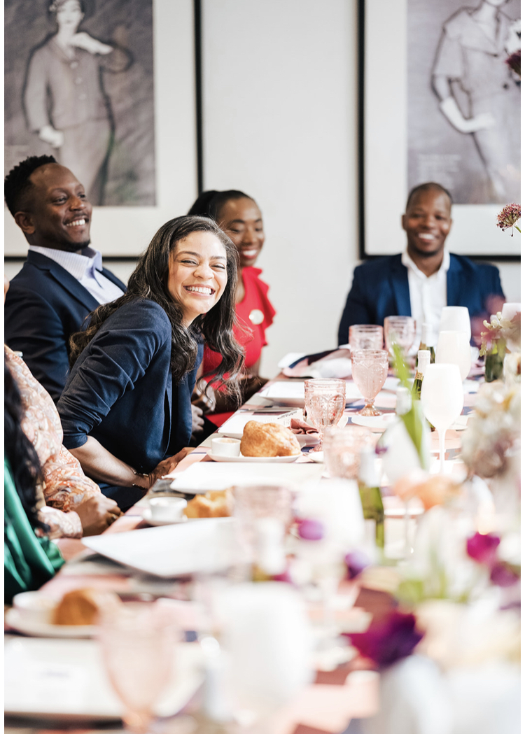 A guest enjoying conversation at the table