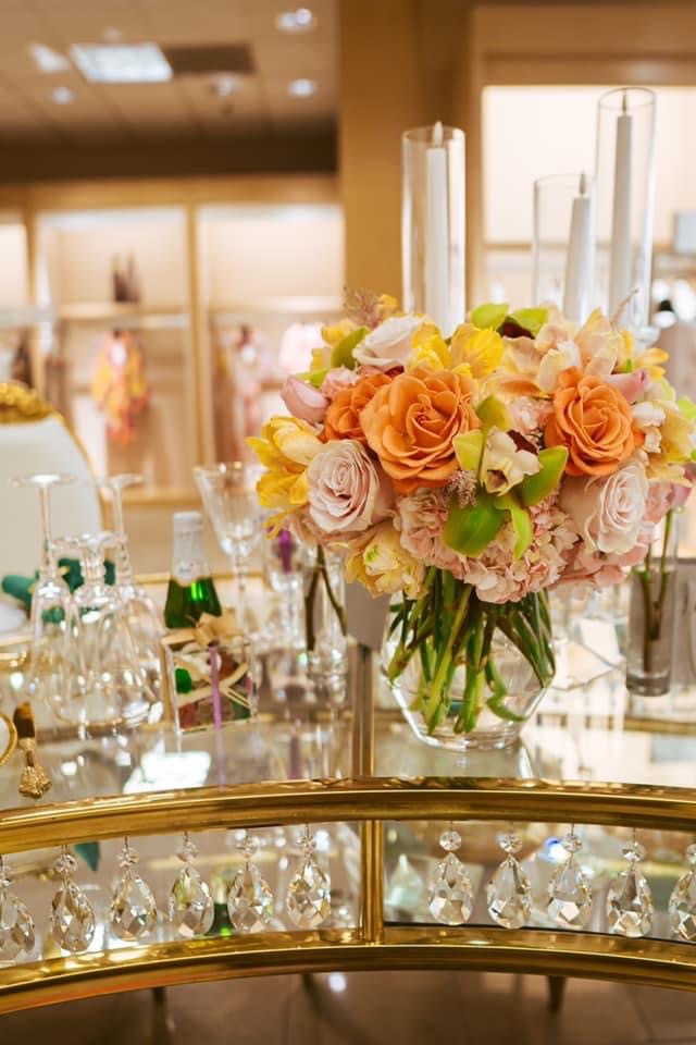 Peach florals and crystal details arranged for an intimate gathering