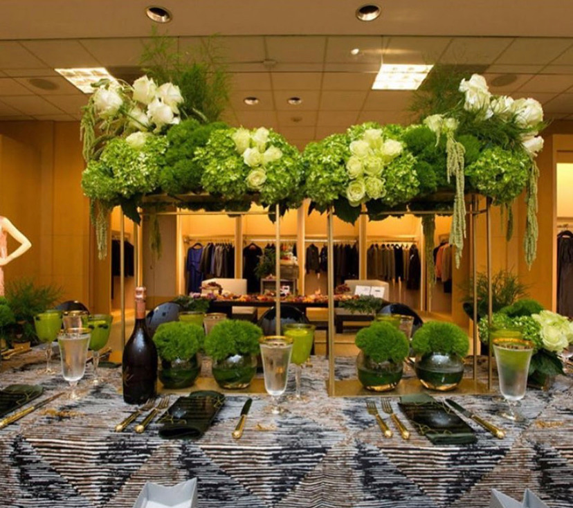A complete green floral table designed for twenty guests