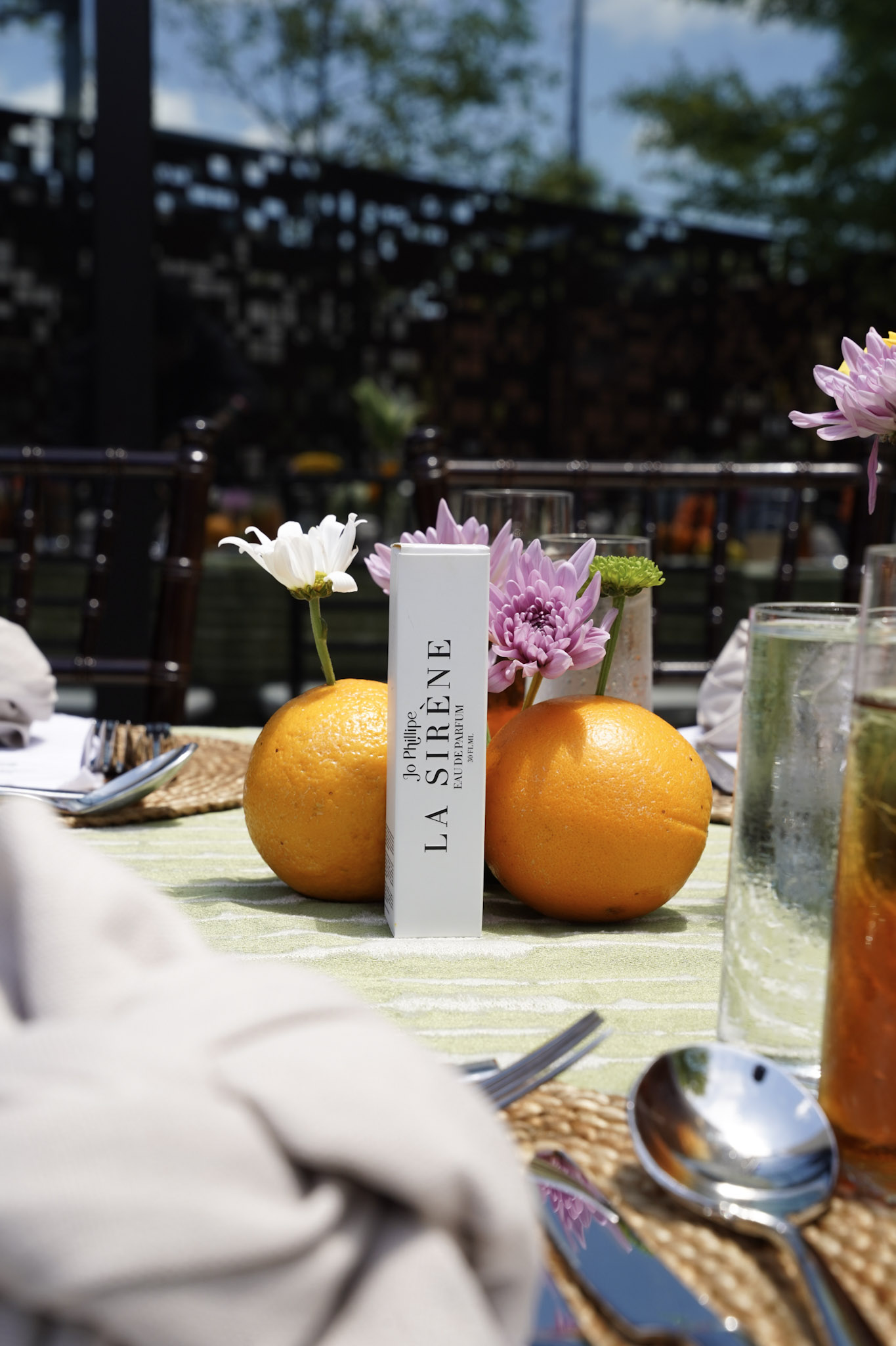 A fragrance partner woven into the table setting